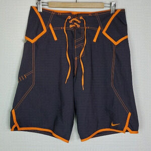 NIKE  medium orange and dark grey 32" swim shorts